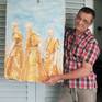Me holding up the painting