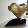 the lite thru the window gives you a glimpse into the ice qualities of this sculpture