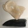this stone has lots of depth......Italian Alabaster is from an ancient sea bed..a time frozen time capsule full of natures activity