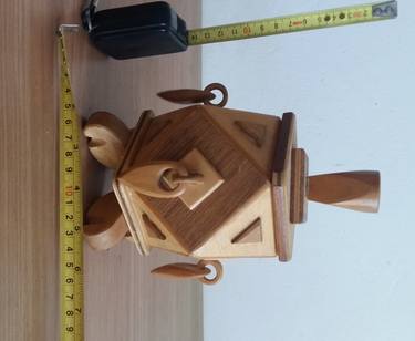 Octahedron wood sculpted box with earrings thumb