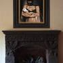 The Understanding over Carved Black Cantera Fireplace