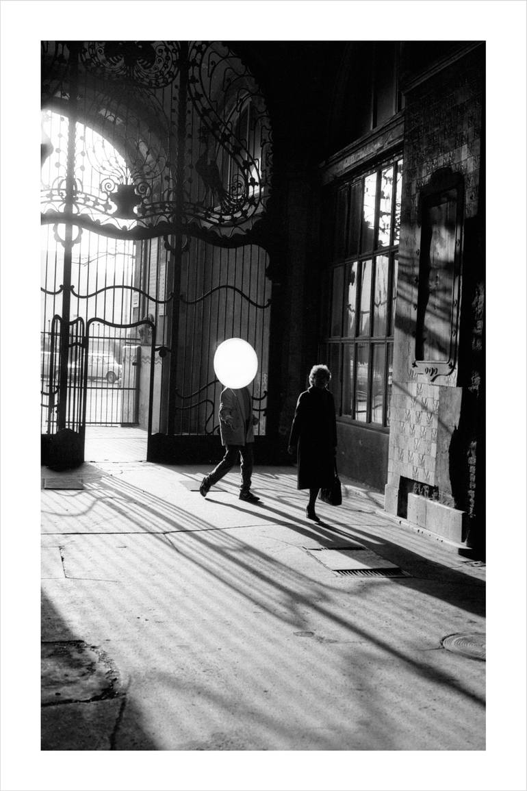 Man holding balloon in his hand Photography by Bruno Bourel | Saatchi Art