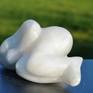 A reclining nude from white albaster stone.Inspired by the shapes off the woman body. The detail  is hereby subordinated to the shape. Albaster is a white ,more or less tranculent, stone.