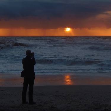 Painting a sunset on the beach near Agger, Denmark thumb