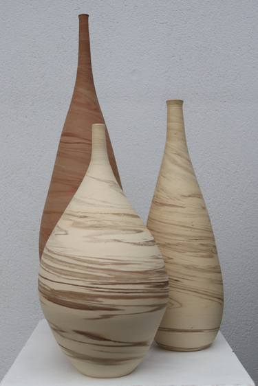 Three mixed clay vessels thumb