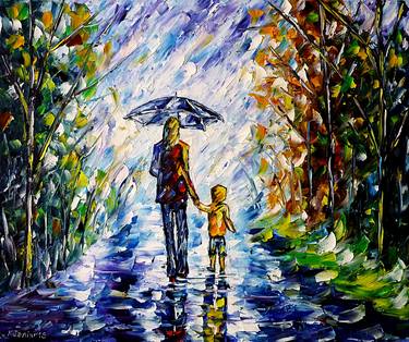 Woman with child in the rain thumb