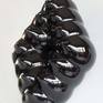 The ceramic work start like a documentary about the cosmos  and the univers. It s look like a open space in univers where you can see yourself. Because of the use of the black shiny glaze, that it s perfect to create this mood.