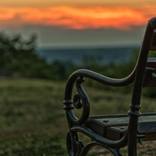Bench at sunset by Vanja Vidaković