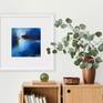 Meridian styled in white frame over bookcase