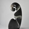 Vertical composition of waves, playing with the different possibilities of textures on the stone.