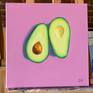 Oil painting on canvas of a sliced avocado on a light purple background.
The painting is ready to hang with hardware attached in the back.