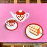 Oil painting of a colorful white and red porcelain tea set and a slice of layered cake against the pink background.

The painting is ready to hang with hardware attached in the back.