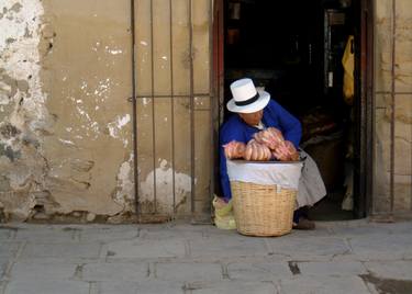 Woman selling  in Peru thumb