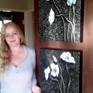 Cherie Roe Dirksen with her paintings