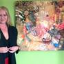 Artist, Cherie Roe Dirksen, with painting