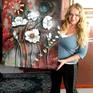 Artist with her painting