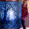 Cherie Roe Dirksen with her painting to show scale