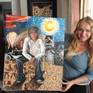 Cherie Roe Dirksen with her painting