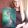 Artist, Cherie Roe Dirksen, with painting to show scale
