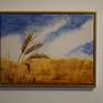 Wheat ears blowing in the wind with a wooden shadow gap frame with the colors gold and white