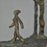 This Adam and Eve is the first in a series of three.
Here the famous couple is still playing.
In the second one Eve could not step out of the border so she was a bit frozen standing on the edge.
In the third one she found the ultimate solution: she escaped by flying away...
Original bronze sculpture.