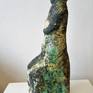 Mother Earth, made of clay, glazed with special oxides and metal powders.

I am not interested in a mere realistic image, I want to express the essence.