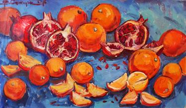 Festive still life with oranges and pomegranates. thumb