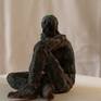 Antique sculpture has inspired this sculpture.
A seated man, dived into his thoughts.
It ' made out of clay, with wax patinas, given soft ligtht reflexions