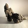 A reclining woman,lost in her thoughts...
Thi sculpture is made out of clay, of clay, hight temperature burnt, which give rise to a semi vitrified vivid material.