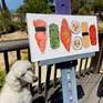 SUSHI AT LARGE on my easel outside