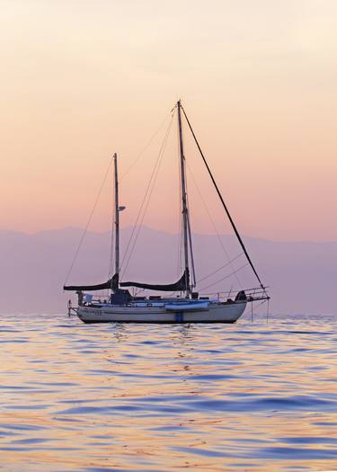 Sailboat at sunset thumb