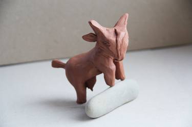 Terracota goat in the wild thumb