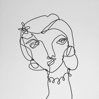 Woman with a necklace thumb
