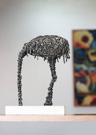 Karen Axikyan/Escape from reality 28x22x10 2.2kg iron, travertine thumb