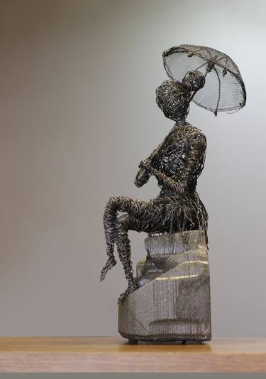 Karen Axikyan/The girl with the umbrella (29x12x12 1.7kg Iron, basalt) thumb