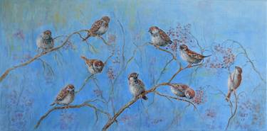 Flock of sparrows on branches. thumb