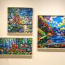 The artist with three of his most recent works on display including Blooms Among the Planes