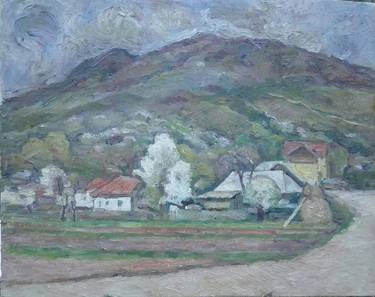 Village with hill on the background thumb
