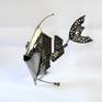 Metal sculpture of a fish.
This sculpture was made from metal, 3D, free standing work of art.