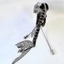 Metal sculpture of a fish.
This sculpture was made from metal, 3D, free standing work of art.