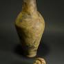 Stoneware "Resonator" Instrument (@+/-100Hz), Hand-built, 17.7"x6.5", burnished, cone 10 fired, hand-sanded, iron oxide and copper carbonate effects. The figurative element represents the North Wind or one of many ancient gods of the winds, Boreas, the Greek god of the north winds.
This produces a strong deep tone when played. The high fire process adds to the tonal intensity. One-of-a-kind, unique and attention grabbing.