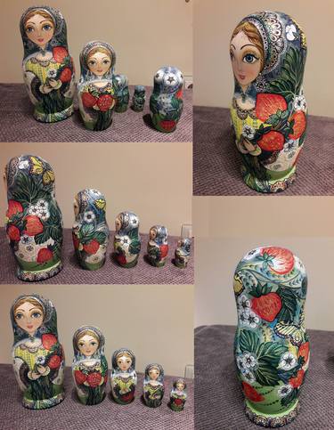 A matryoshka of five attachments, painted in a modern decorative style on a summer motif. thumb