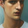 This is a portrait of a handsome young man in a white Henley shirt with a moody, ambiguous expression. I love the element of mystery in this sensual face.
