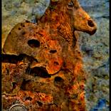 The Minotaur Born in Stone and Coin by Algis Kemezys