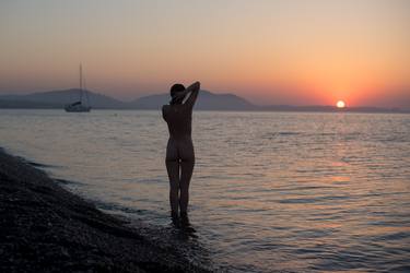 Naked silhouette girl sees sunrise in sea - Limited Edition 1 of 1 thumb