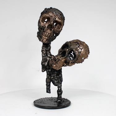 Eros and agape - skull metal sculpture thumb