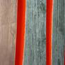 Art pieces utilizing reclaimed wood seem to be reasonably common, however, I wanted to try something different and incorporate some finesse into the finishing and shaping. I stumbled across some cypress at a nearby antique store and after considerable thought came up with this design.

The reclaimed sections juxtapose well with the sculpted copper-leafed sections and the orange edges really accentuate the curves.