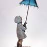 Have you ever stopped in the rain, standing under an umbrella? This girl did exactly that. She looks up at the falling drops and thinks about something of her own. Most likely it is pure girlish dreams of love and happiness. And what do you think?